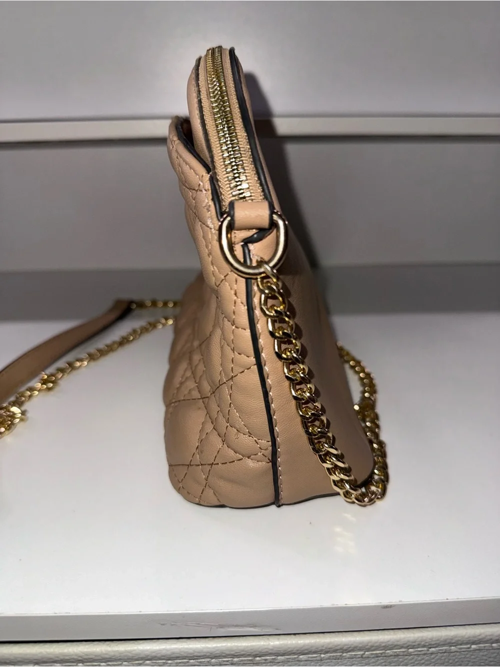 Quilted Taupe Crossbody Bag with Gold Medallion